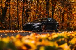 Concaver CVR7 Bronze alloy wheel mounted on car in an atmospheric setting