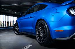 Concaver CVR7 Grey alloy wheel mounted on car in an atmospheric setting