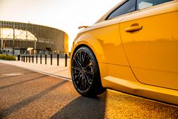 Concaver CVR7 Grey alloy wheel mounted on car in an atmospheric setting