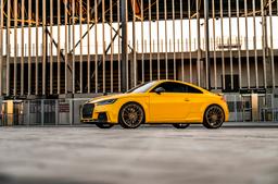 Concaver CVR7 Bronze alloy wheel mounted on car in an atmospheric setting