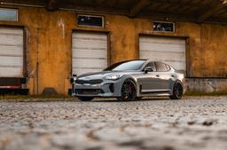 Concaver CVR7 Black alloy wheel mounted on car in an atmospheric setting