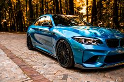 Concaver CVR7 Black alloy wheel mounted on car in an atmospheric setting