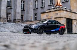 Concaver CVR7 Black alloy wheel mounted on car in an atmospheric setting