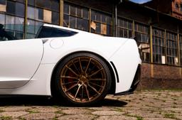 Concaver CVR7 Bronze alloy wheel mounted on car in an atmospheric setting