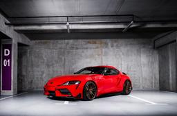 Concaver CVR7 Bronze alloy wheel mounted on car in an atmospheric setting