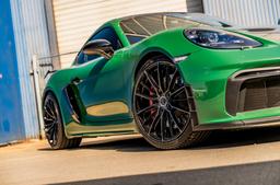 Concaver CVR7 Black alloy wheel mounted on car in an atmospheric setting