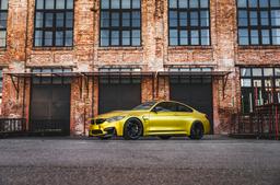 Concaver CVR7 Black alloy wheel mounted on car in an atmospheric setting