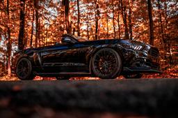 Concaver CVR7 Black alloy wheel mounted on car in an atmospheric setting