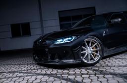 Concaver CVR8 Silver alloy wheel mounted on car in an atmospheric setting