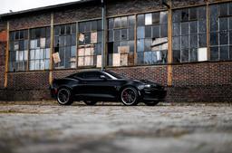 Concaver CVR8 Grey alloy wheel mounted on car in an atmospheric setting