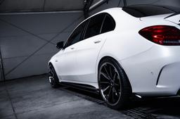 Concaver CVR8 Black alloy wheel mounted on car in an atmospheric setting