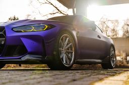 Concaver CVR8 Silver alloy wheel mounted on car in an atmospheric setting