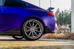 Concaver CVR8 Silver alloy wheel mounted on car in an atmospheric setting