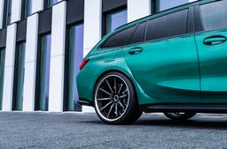 Concaver CVR8 Black alloy wheel mounted on car in an atmospheric setting