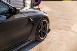 Concaver CVR9 Grey alloy wheel mounted on car in an atmospheric setting