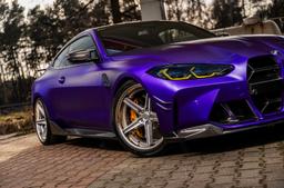 Concaver CVR9 Silver alloy wheel mounted on car in an atmospheric setting