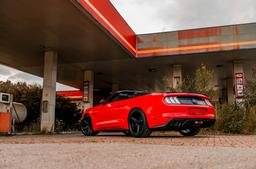 Concaver CVR9 Black alloy wheel mounted on car in an atmospheric setting