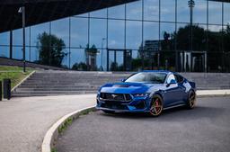 Concaver CVR9 Bronze alloy wheel mounted on car in an atmospheric setting