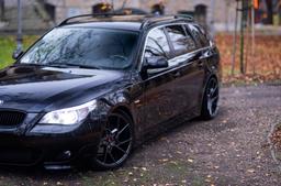 JR Wheels JR33 Grey alloy wheel mounted on car in an atmospheric setting