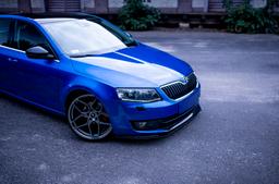 JR Wheels JR34 Grey alloy wheel mounted on car in an atmospheric setting