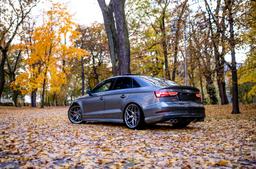 JR Wheels JR35 Grey alloy wheel mounted on car in an atmospheric setting