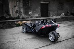 JR Wheels JR35 Silver alloy wheel mounted on car in an atmospheric setting