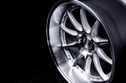JR Wheels JR41 Silver alloy wheel mounted on car in an atmospheric setting
