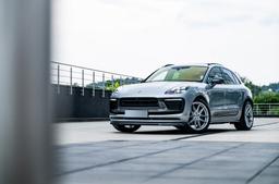 JR Wheels JR44 Silver alloy wheel mounted on car in an atmospheric setting