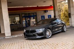 JR Wheels JR44 Silver alloy wheel mounted on car in an atmospheric setting