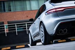 JR Wheels JR44 Silver alloy wheel mounted on car in an atmospheric setting