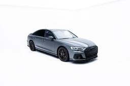 JR Wheels JR45 Bronze alloy wheel mounted on car in an atmospheric setting