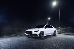 JR Wheels JR45 Grey alloy wheel mounted on car in an atmospheric setting