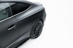 JR Wheels JR46 Grey alloy wheel mounted on car in an atmospheric setting