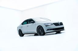 JR Wheels JR46 Grey alloy wheel mounted on car in an atmospheric setting