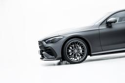 JR Wheels JR46 Grey alloy wheel mounted on car in an atmospheric setting