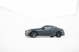 JR Wheels JR46 Grey alloy wheel mounted on car in an atmospheric setting