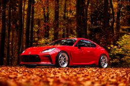 JR Wheels JR47 Silver alloy wheel mounted on car in an atmospheric setting