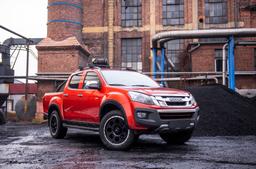 JR Wheels JRX4 Musta alumiinivanteet asennettuna autoon tunnelmallisessa ympäristössä