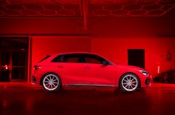 JR Wheels SL-02 Silver alloy wheel mounted on car in an atmospheric setting