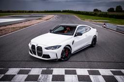 JR Wheels SL-02 Black alloy wheel mounted on car in an atmospheric setting