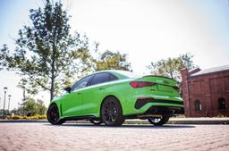 JR Wheels SL-02 Grey alloy wheel mounted on car in an atmospheric setting