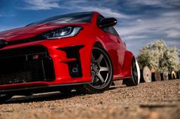 JR Wheels SL-03 Grey alloy wheel mounted on car in an atmospheric setting