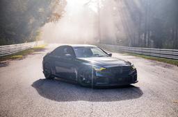 JR Wheels SL-03 Custom alloy wheel mounted on car in an atmospheric setting