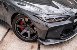 JR Wheels SL-03 Grey alloy wheel mounted on car in an atmospheric setting