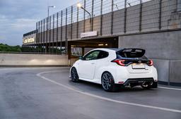 JR Wheels SL-04 Grey alloy wheel mounted on car in an atmospheric setting