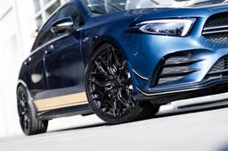 Vesser VSR1 Gloss Graphite alloy wheel mounted on car in an atmospheric setting