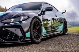 Vesser VSR2 Satin Graphite alloy wheel mounted on car in an atmospheric setting