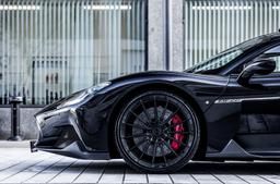 Vesser VSR4 Gloss Candy Violet alloy wheel mounted on car in an atmospheric setting