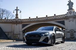 Vesser VSR4 Gloss Graphite alloy wheel mounted on car in an atmospheric setting