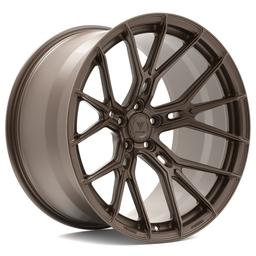 Vesser VSR6 Satin Candy Red alloy wheel mounted on car in an atmospheric setting